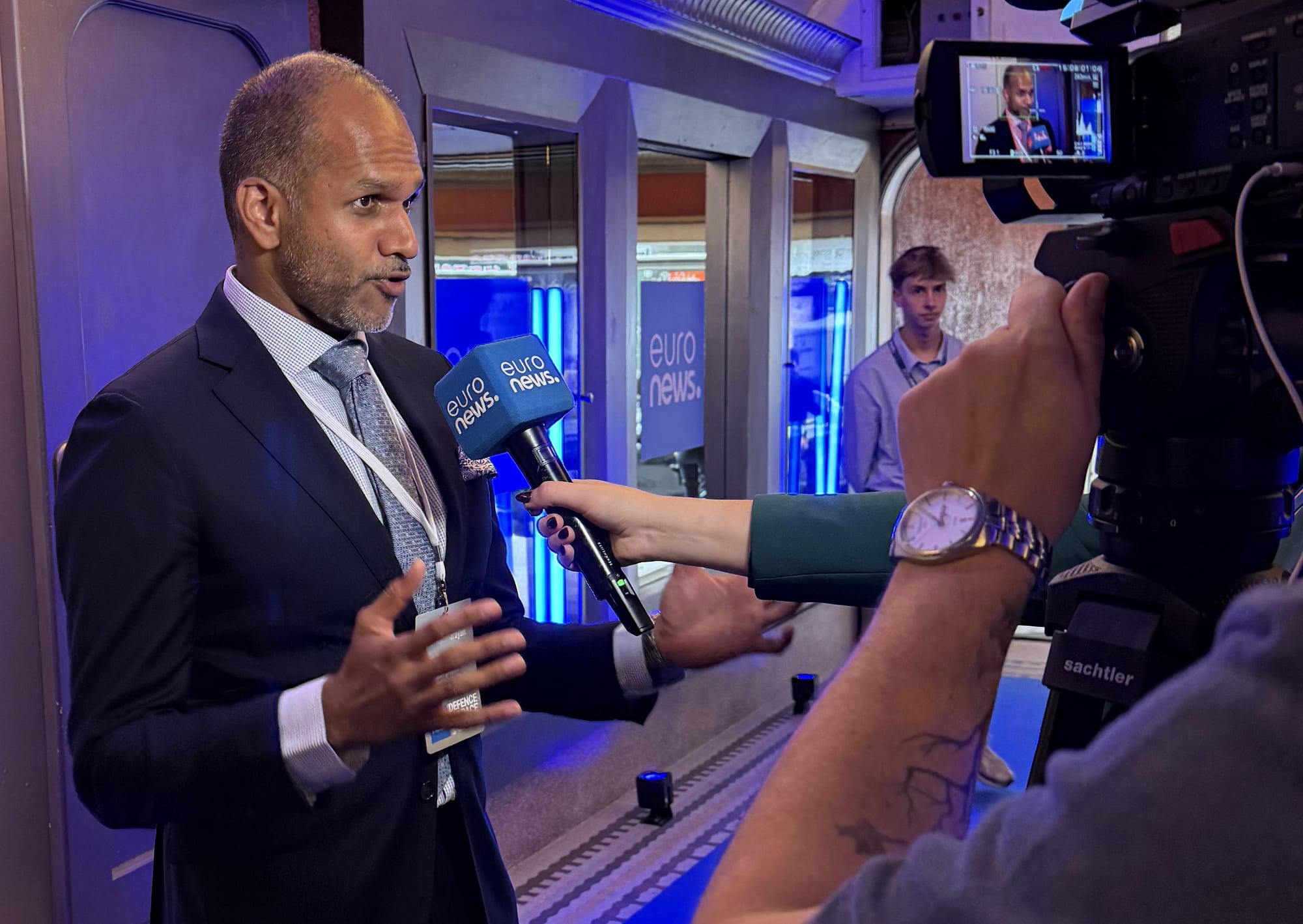 Rahul Venkit being interviewed by a Euronews camera crew